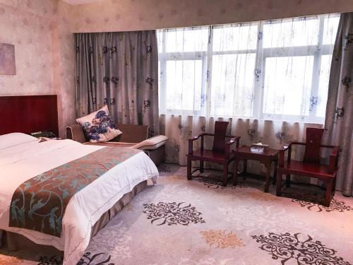 Imagen de la habitación del Hotel Guangxi Golden Holiday. Foto 6