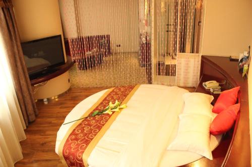 Imagen general del Hotel Guangxi Golden Holiday. Foto 2