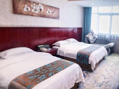 Imagen de la habitación del Hotel Guangxi Golden Holiday. Foto 7