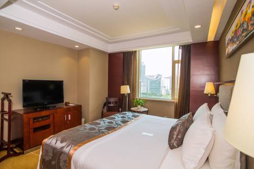 Imagen de la habitación del Hotel Guangxi Wharton International. Foto 9