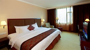 Imagen de la habitación del Hotel Guangxi Wharton International. Foto 10