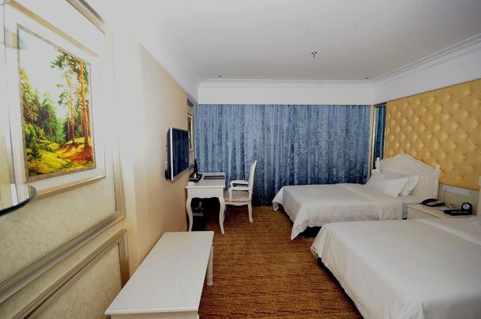 Imagen de la habitación del Hotel Guangxin International Hotel. Foto 6