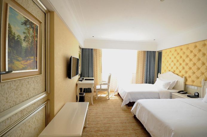 Imagen de la habitación del Hotel Guangxin International Hotel. Foto 7