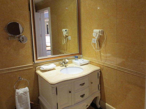 Imagen de la habitación del Hotel Guangxin International Hotel. Foto 11