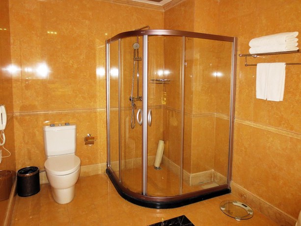 Imagen de la habitación del Hotel Guangxin International Hotel. Foto 17