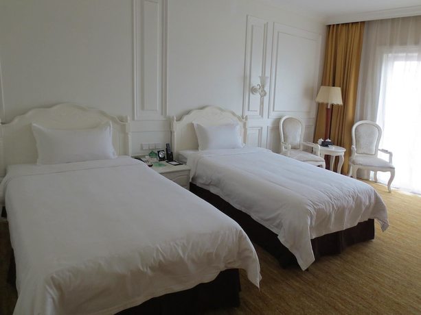 Imagen de la habitación del Hotel Guangxin International Hotel. Foto 18