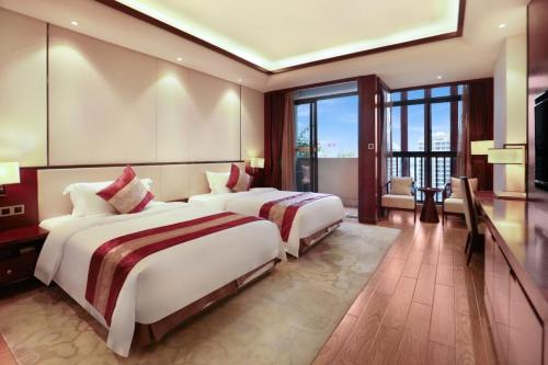 Imagen de la habitación del Hotel Guangyuezun Liuzhou Sanjiang Drum Tower Bird\'s Nest Branch. Foto 9