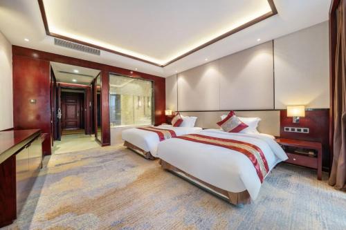 Imagen general del Hotel Guangyuezun Liuzhou Sanjiang Drum Tower Bird\'s Nest Branch. Foto 1