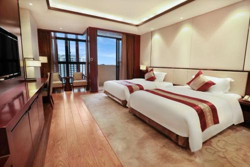 Imagen general del Hotel Guangyuezun Liuzhou Sanjiang Drum Tower Bird\'s Nest Branch. Foto 2