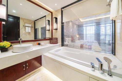 Imagen general del Hotel Guangyuezun Liuzhou Sanjiang Drum Tower Bird\'s Nest Branch. Foto 3