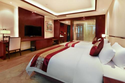 Imagen general del Hotel Guangyuezun Liuzhou Sanjiang Drum Tower Bird\'s Nest Branch. Foto 5