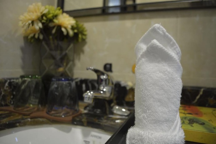 Imagen de la habitación del Hotel Guangzhou Ahotel Service Apartment. Foto 4