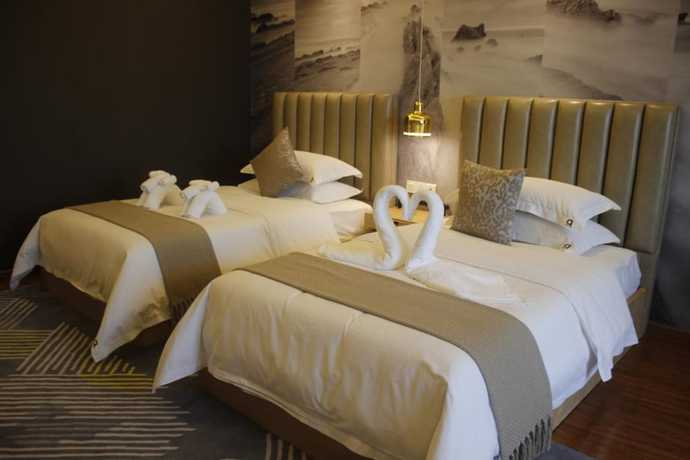 Imagen de la habitación del Hotel Guangzhou Ahotel Service Apartment. Foto 15