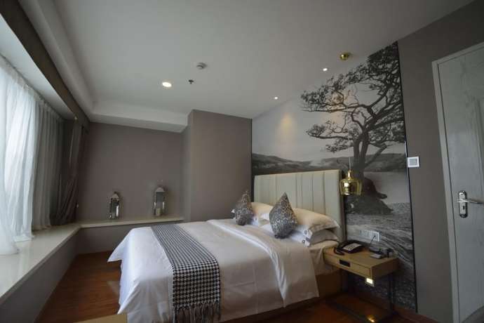 Imagen de la habitación del Hotel Guangzhou Ahotel Service Apartment. Foto 16