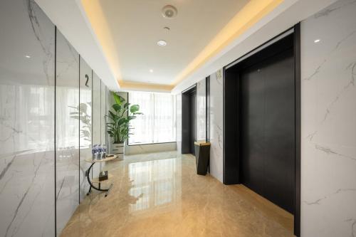Imagen general del Hotel Guangzhou Baiyun Airport COCO. Foto 9