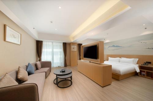 Imagen general del Hotel Guangzhou Baiyun Airport COCO. Foto 12