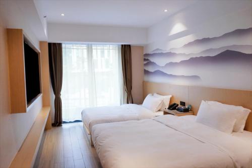 Imagen general del Hotel Guangzhou Baiyun Airport COCO. Foto 16