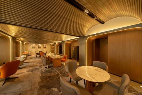 Imagen general del Hotel Guangzhou Baiyun Airport Rezen Select. Foto 3