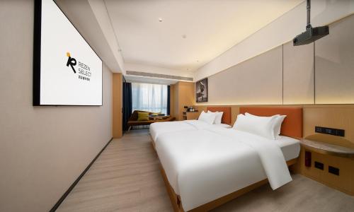 Imagen general del Hotel Guangzhou Baiyun Airport Rezen Select. Foto 8