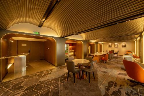 Imagen general del Hotel Guangzhou Baiyun Airport Rezen Select. Foto 9