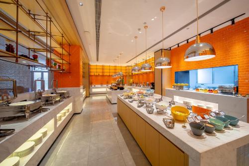 Imagen general del Hotel Guangzhou Baiyun Airport Rezen Select. Foto 14