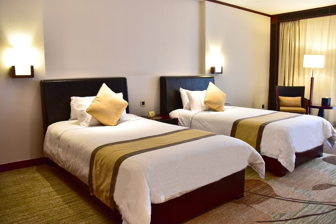 Imagen de la habitación del Hotel Guangzhou Baiyun International Convention Center. Foto 5