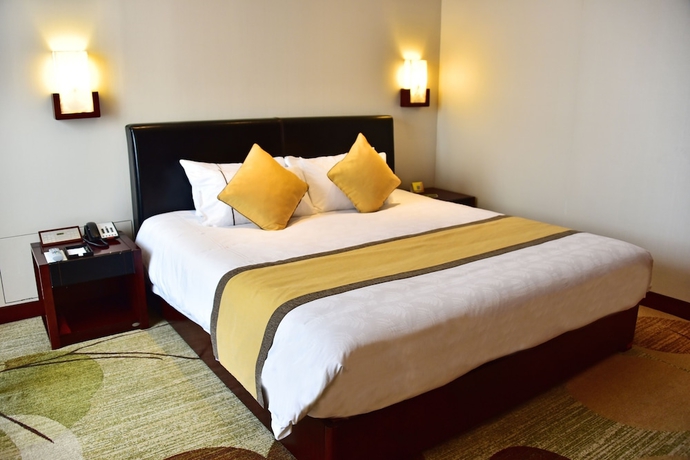 Imagen de la habitación del Hotel Guangzhou Baiyun International Convention Center. Foto 6