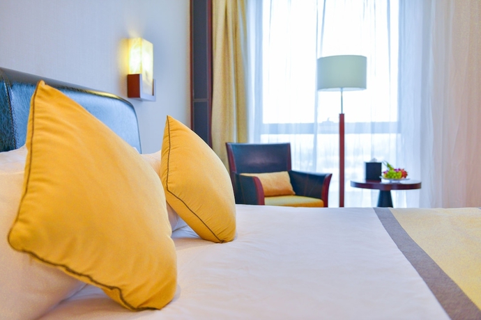 Imagen de la habitación del Hotel Guangzhou Baiyun International Convention Center. Foto 7