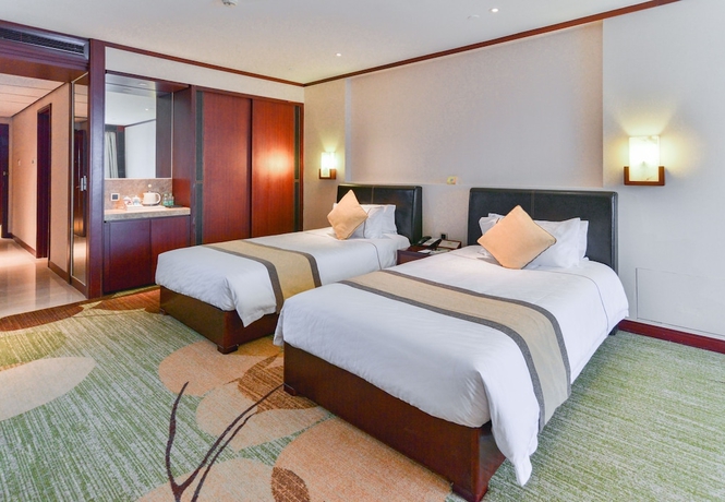 Imagen de la habitación del Hotel Guangzhou Baiyun International Convention Center. Foto 8