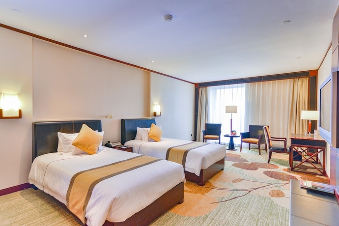 Imagen de la habitación del Hotel Guangzhou Baiyun International Convention Center. Foto 9