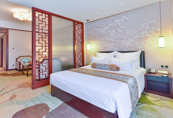 Imagen de la habitación del Hotel Guangzhou Baiyun International Convention Center. Foto 13