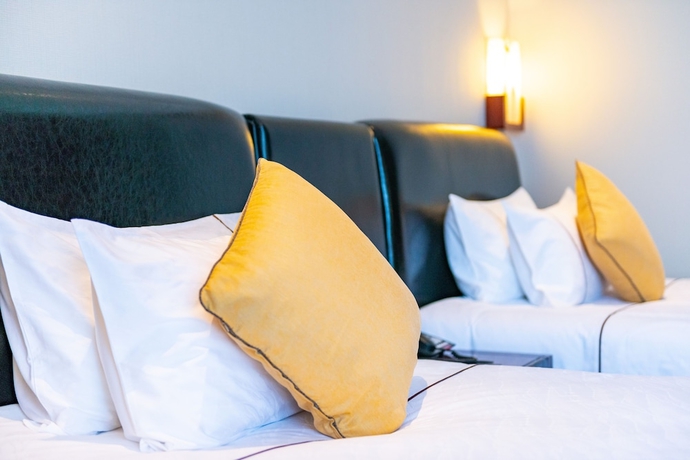 Imagen de la habitación del Hotel Guangzhou Baiyun International Convention Center. Foto 16