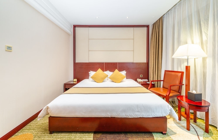 Imagen de la habitación del Hotel Guangzhou Baiyun International Convention Center. Foto 18