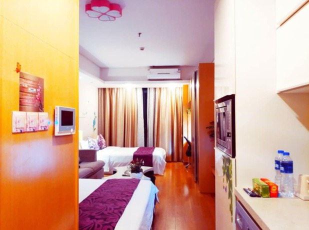 Imagen de la habitación del Hotel Guangzhou Bojing Hopson Plaza Apartment. Foto 3