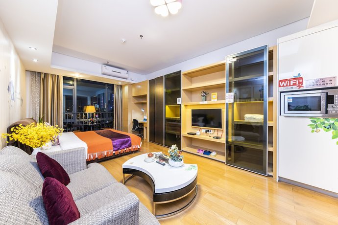 Imagen de la habitación del Hotel Guangzhou Bojing Hopson Plaza Apartment. Foto 12
