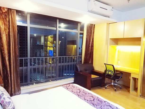 Imagen de la habitación del Hotel Guangzhou Bojing Hopson Plaza Apartment. Foto 14