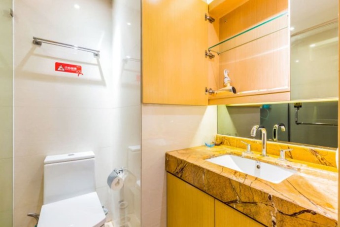 Imagen de la habitación del Hotel Guangzhou Bojing Hopson Plaza Apartment. Foto 18