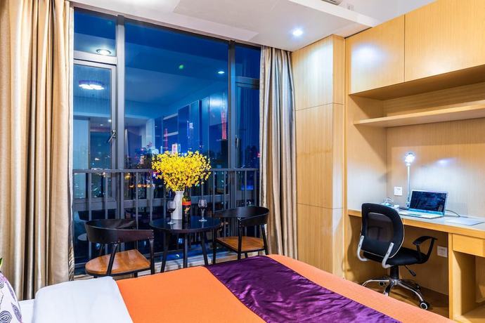 Imagen de la habitación del Hotel Guangzhou Bojing Hopson Plaza Apartment. Foto 19