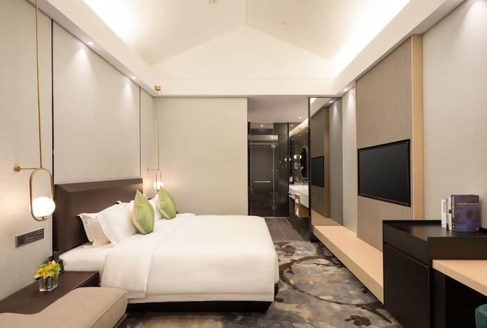 Imagen de la habitación del Hotel Guangzhou Buddy. Foto 5