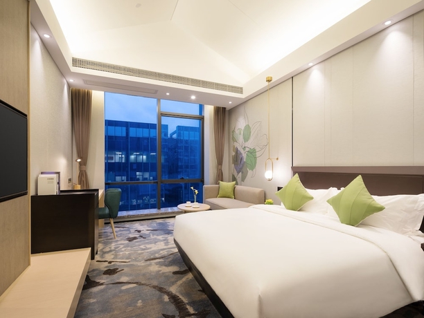 Imagen de la habitación del Hotel Guangzhou Buddy. Foto 6