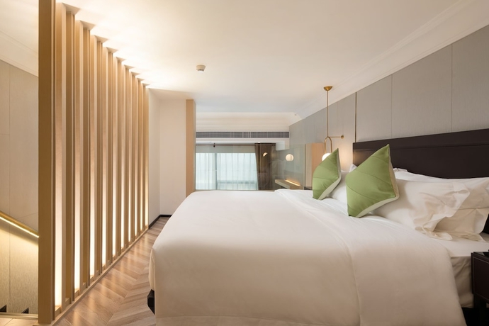 Imagen de la habitación del Hotel Guangzhou Buddy. Foto 10