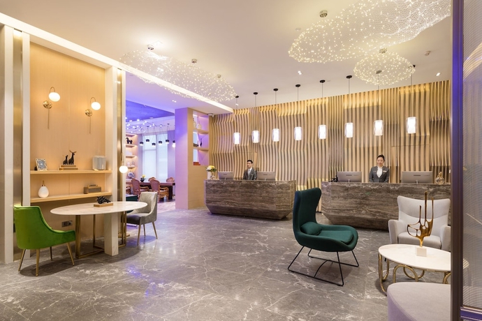 Imagen de los interiores del Hotel Guangzhou Buddy. Foto 19