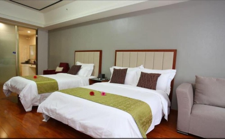 Imagen de la habitación del Hotel Guangzhou Bvlgari Apartment. Foto 16