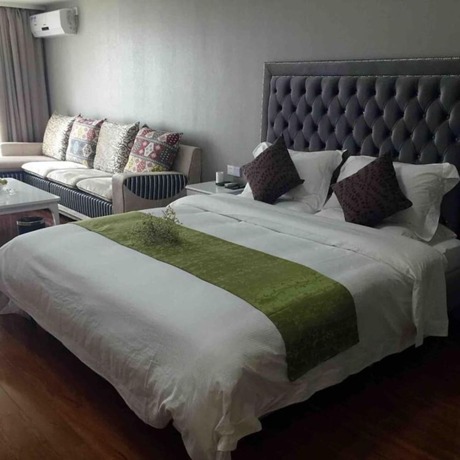 Imagen de la habitación del Hotel Guangzhou Bvlgari Apartment. Foto 18