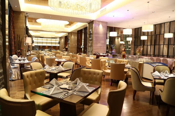 Imagen del bar/restaurante del Hotel Guangzhou Changfeng Gloria Plaza, Zengcheng. Foto 2
