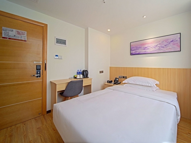 Imagen de la habitación del Hotel Guangzhou Changxing Xintiandi. Foto 12