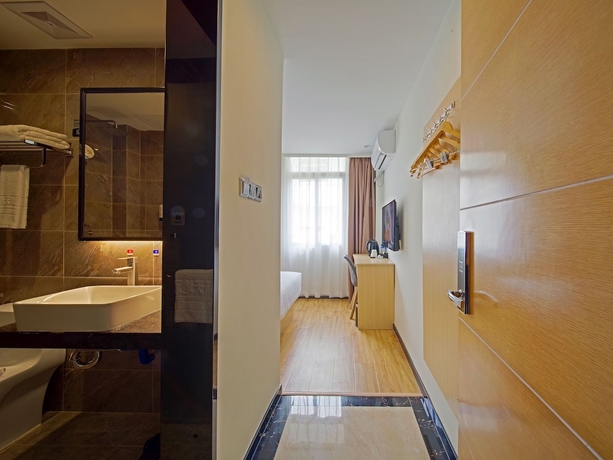 Imagen de la habitación del Hotel Guangzhou Changxing Xintiandi. Foto 14