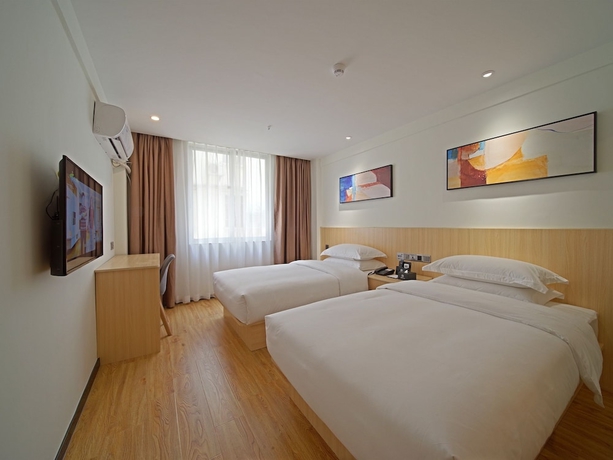 Imagen de la habitación del Hotel Guangzhou Changxing Xintiandi. Foto 16