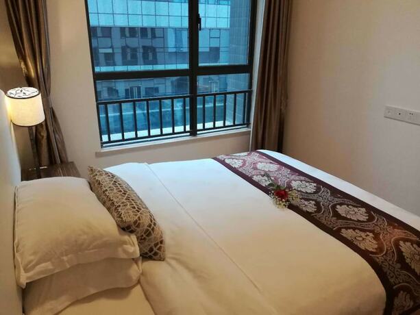 Imagen general del Hotel Guangzhou Chanson Apartment. Foto 11