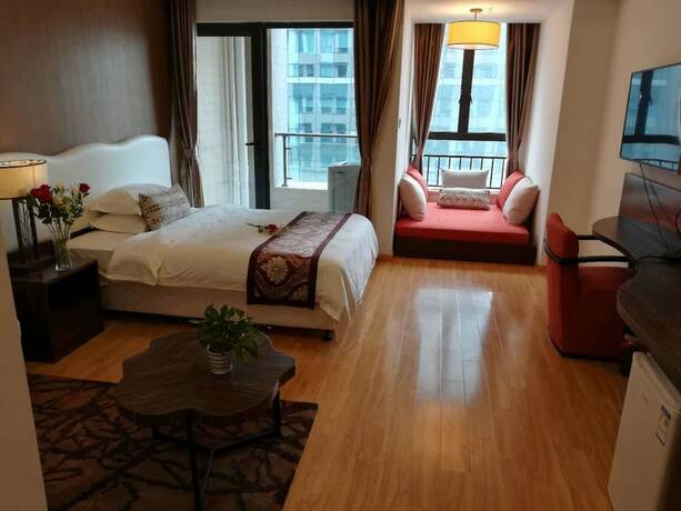 Imagen de la habitación del Hotel Guangzhou Chanson Apartment. Foto 16